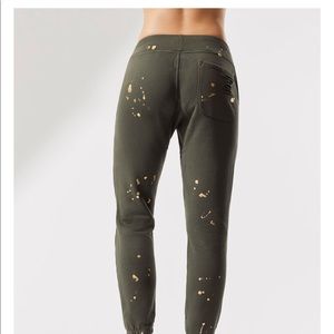 NSF olive and gold splatter sweat pants